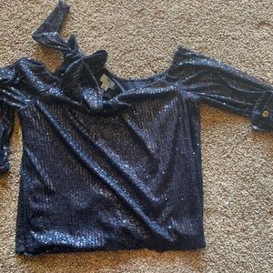 CeCe sequin cold shoulder top.